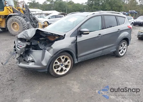 2014 Ford Escape Titanium z USA, uszkodzony, nr VIN 1FMCU0J94EUD63458